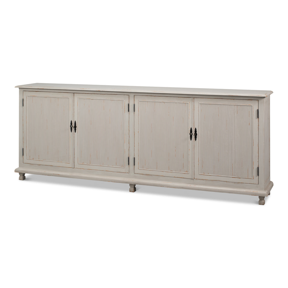 Long gray sideboard with reeded door fronts in reclaimed pine