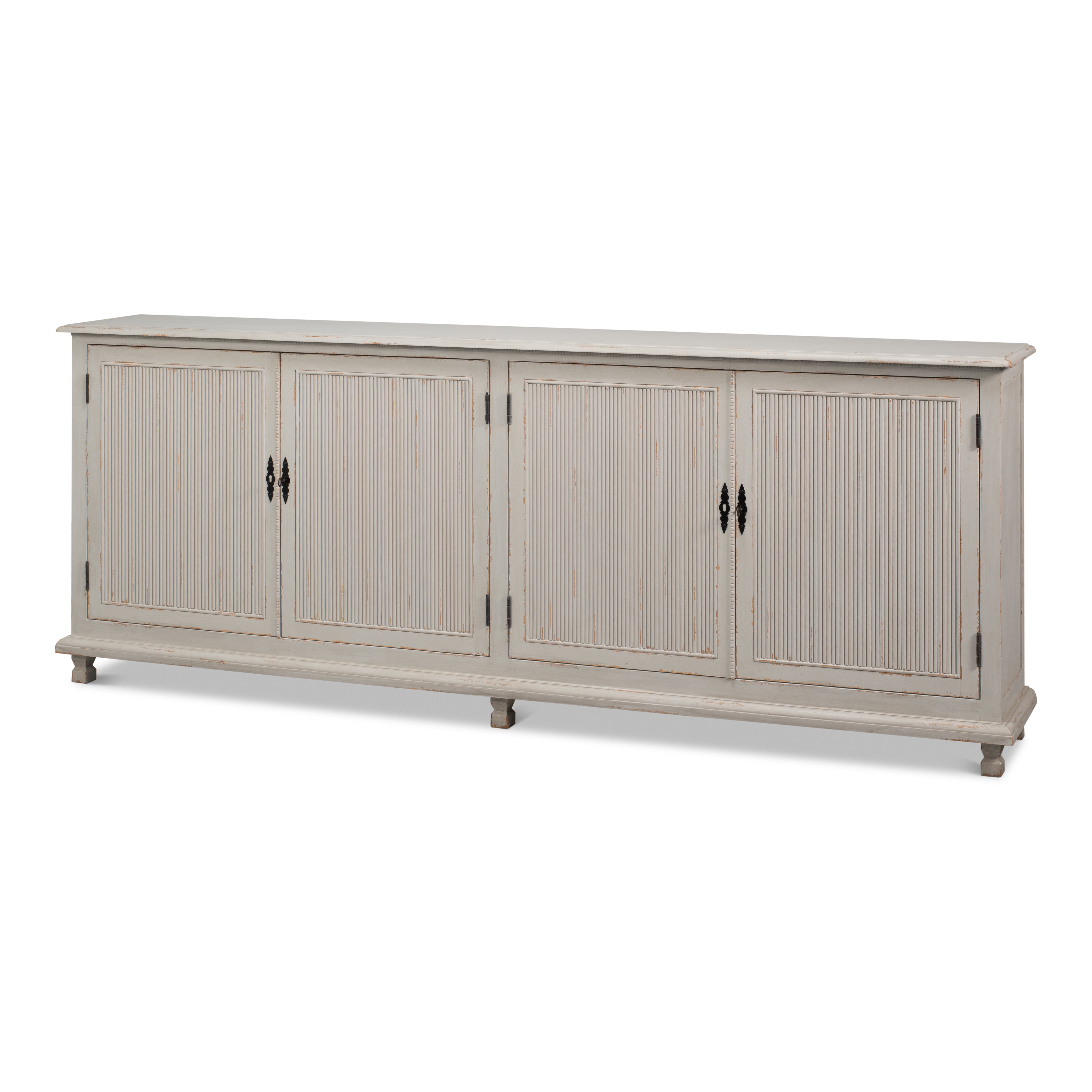Long gray sideboard with reeded door fronts in reclaimed pine
