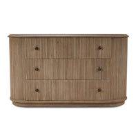 Front view of reeded mahogany oval dresser, all drawers closed.