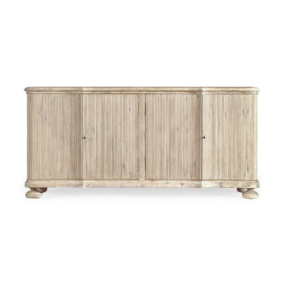 White washed buffet cabinet front view with closed doors.