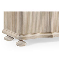Close-up of buffet cabinet's rounded base feet design.