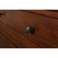 Detail of drawer knob on walnut side cabinet.