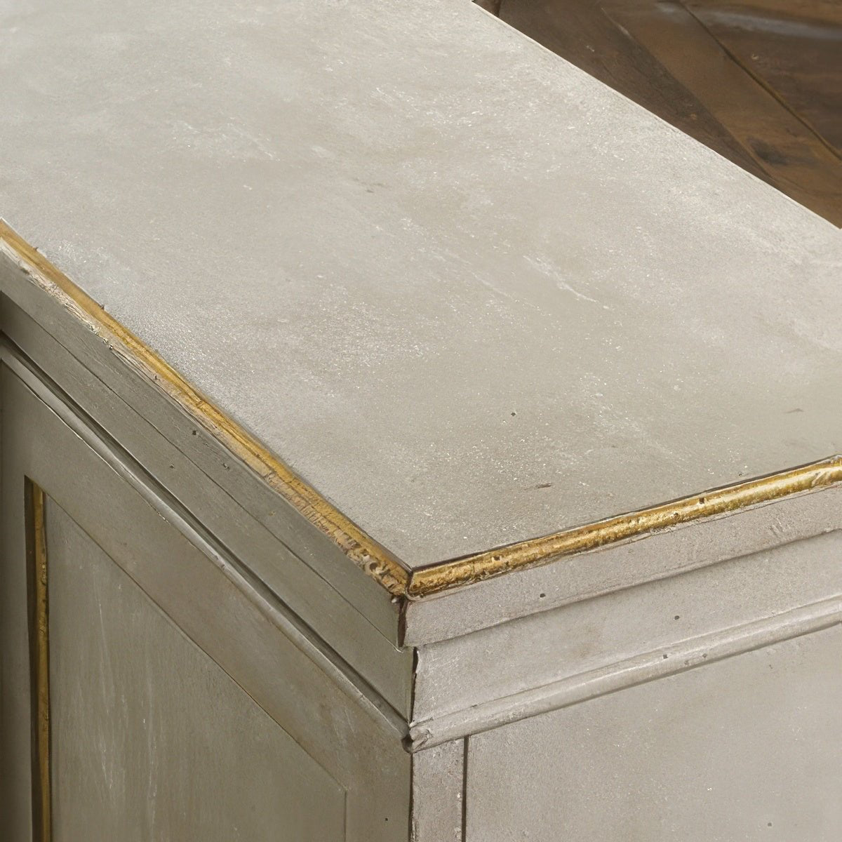 Close-up of credenza's textured top surface.
