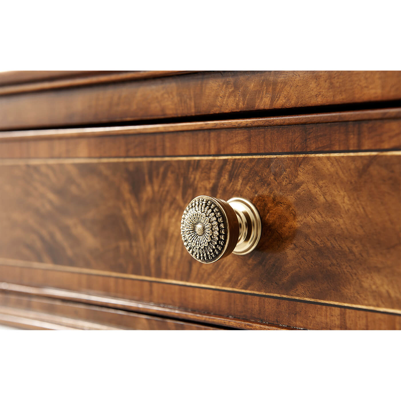 Close-up of Regency console table drawer knob.
