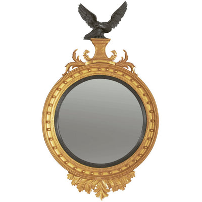 Ornate Regency convex mirror with carved eagle top.