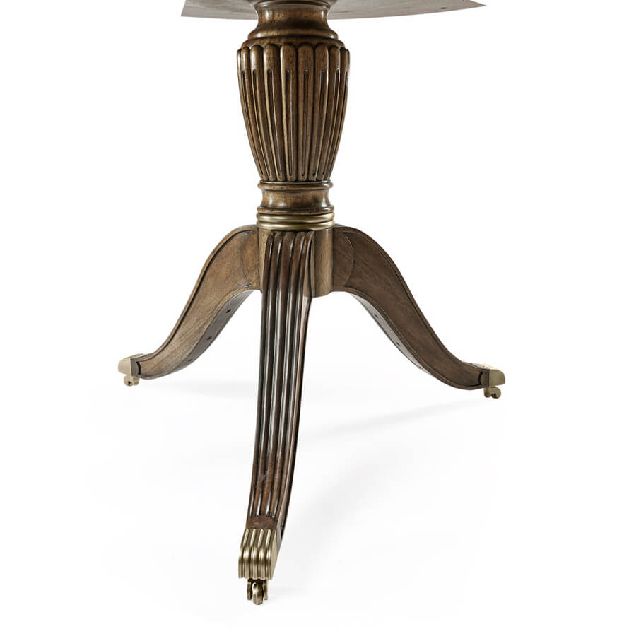 Regency drum end table leg close-up view.