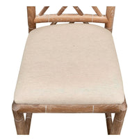 Top view of seat, beige cushion, faux bamboo chair.