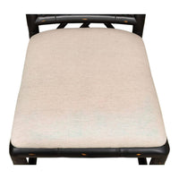 Top view of chair with beige cushion.