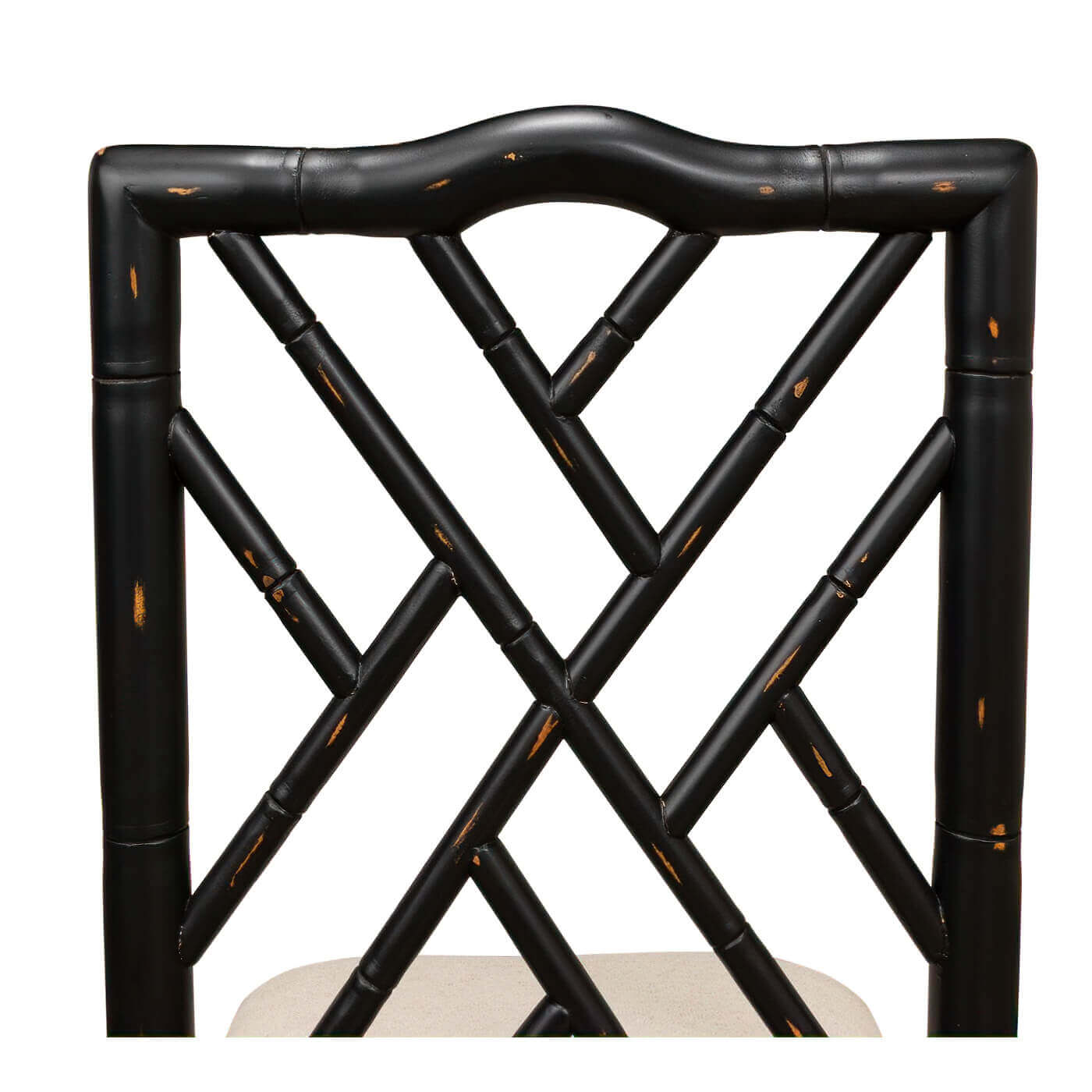 Close-up of chair's black faux bamboo backrest.