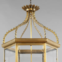 Detailed top view of gold regency hall lantern.