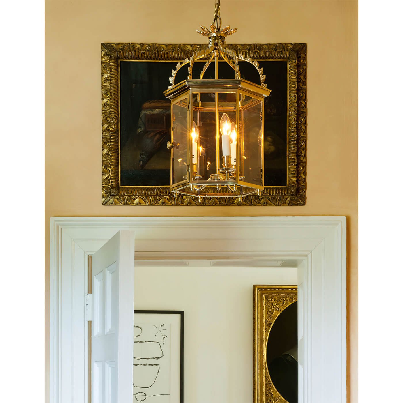 Regency Hall Lantern illuminated, hanging in hallway setting.