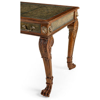 Regency desk corner, claw-foot legs, detailed carvings.