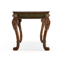 Side view of Regency desk, intricate carved legs.