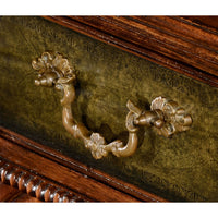 Close-up of brass handle on Regency desk drawer.