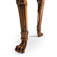 Close-up of Regency desk leg, claw-foot detail.