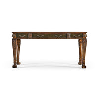 Front view of Regency desk, elegant carved details.