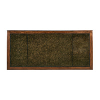 Top view of green leather surface on Regency desk.