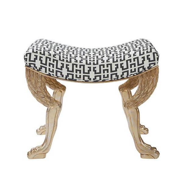Stool with gold lion paw legs, black geometric seat.