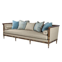 Regency Long Sofa with blue and beige cushions, angled.
