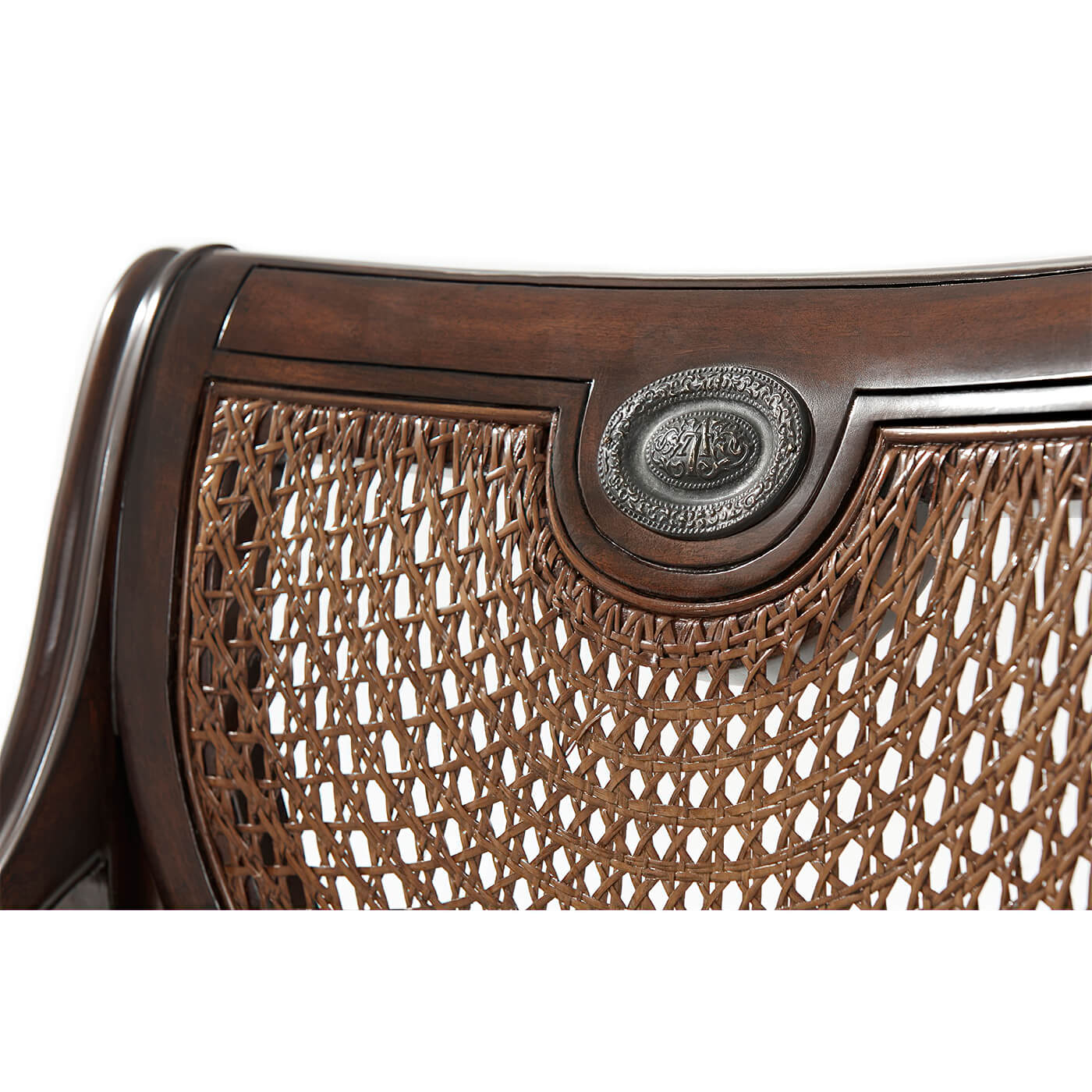 Detail of Regency armchair decorative top back feature.