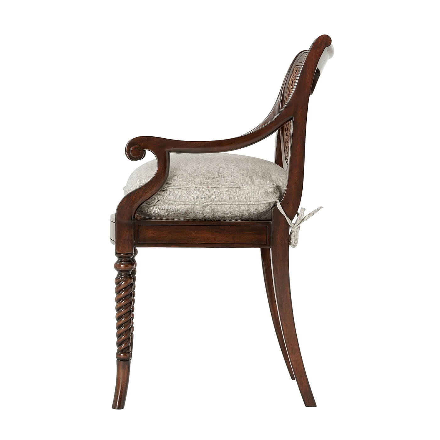 Regency mahogany armchair side profile highlighting intricate arms.