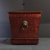 Regency mahogany cellarette, side view with lion handle.