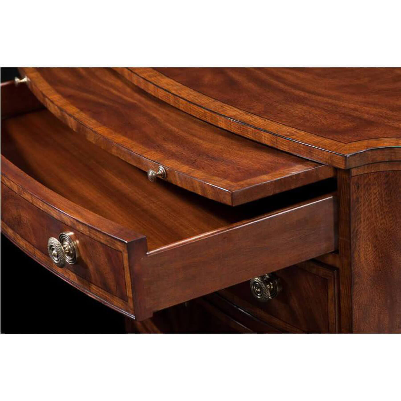 Close-up of open drawer in Regency mahogany chest.