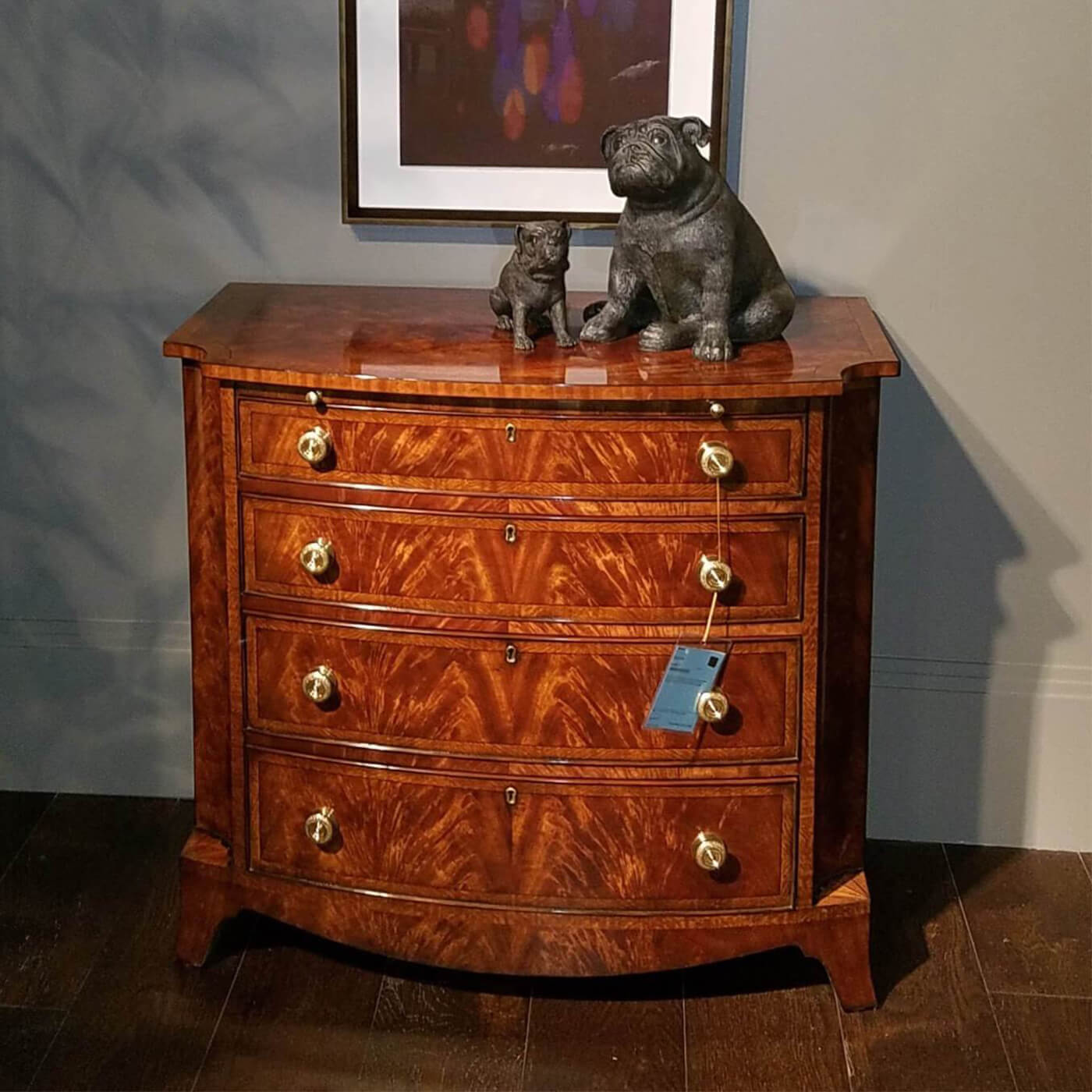 Regency mahogany chest styled with decorative objects on top.