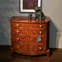 Regency mahogany chest styled with decorative objects on top.