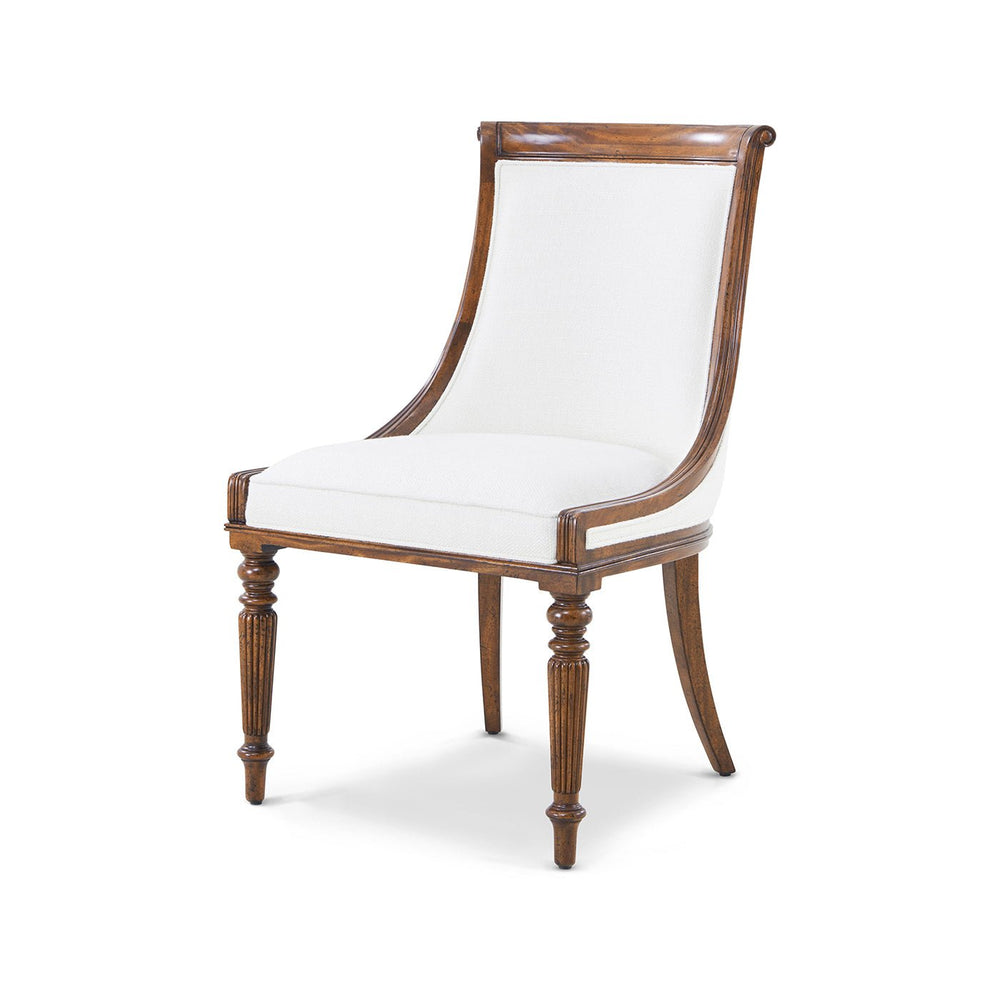 Elegant Regency mahogany dining chair three-quarter view.