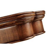 Pedestal detail of mahogany dining table, carved design.