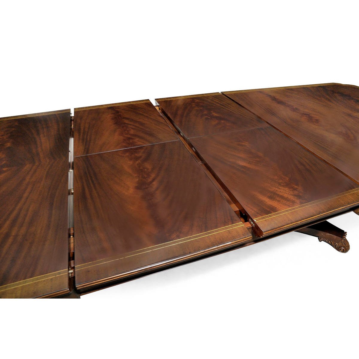 Mahogany dining table extension leaves, wood grain visible.