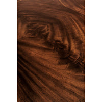 Close-up of wood grain pattern on dining table.