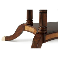Detailed leg design of mahogany extension dining table.
