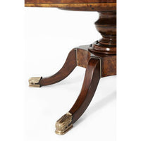 Pedestal leg detail with metal claw feet.