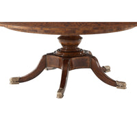 Detailed view of pedestal base and legs of table.