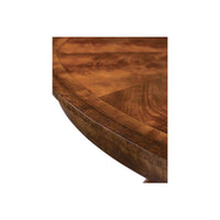 Close-up of mahogany table edge detail.