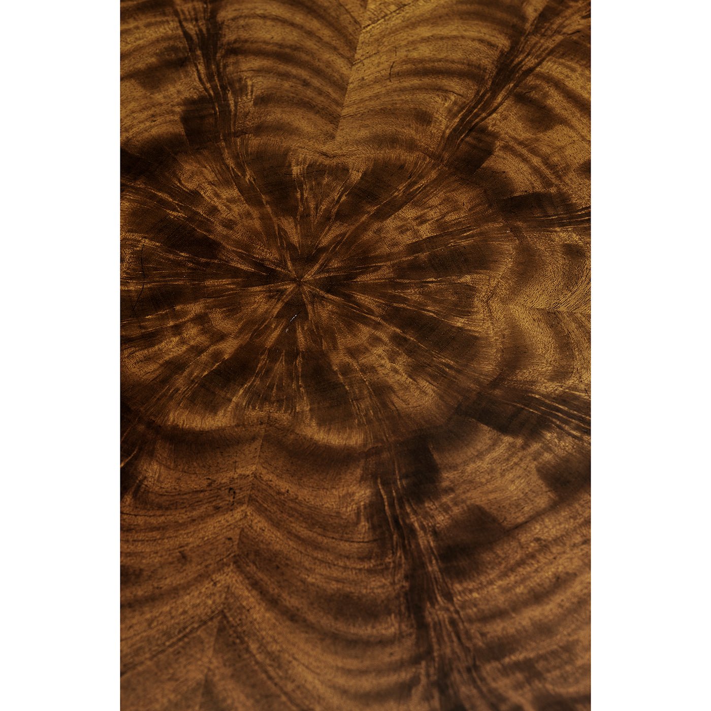 Detailed view of mahogany wood pattern on end table.