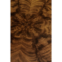 Detailed view of mahogany wood pattern on end table.