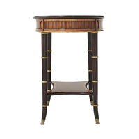 Regency oval side table, side view, decorative elements visible.