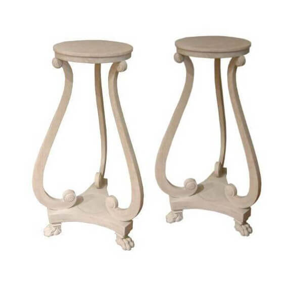 Elegant Regency pedestals with carved detailed legs.