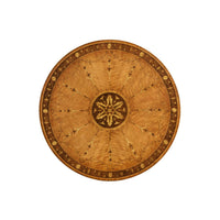 Top view of round satinwood center table, detailed inlay.