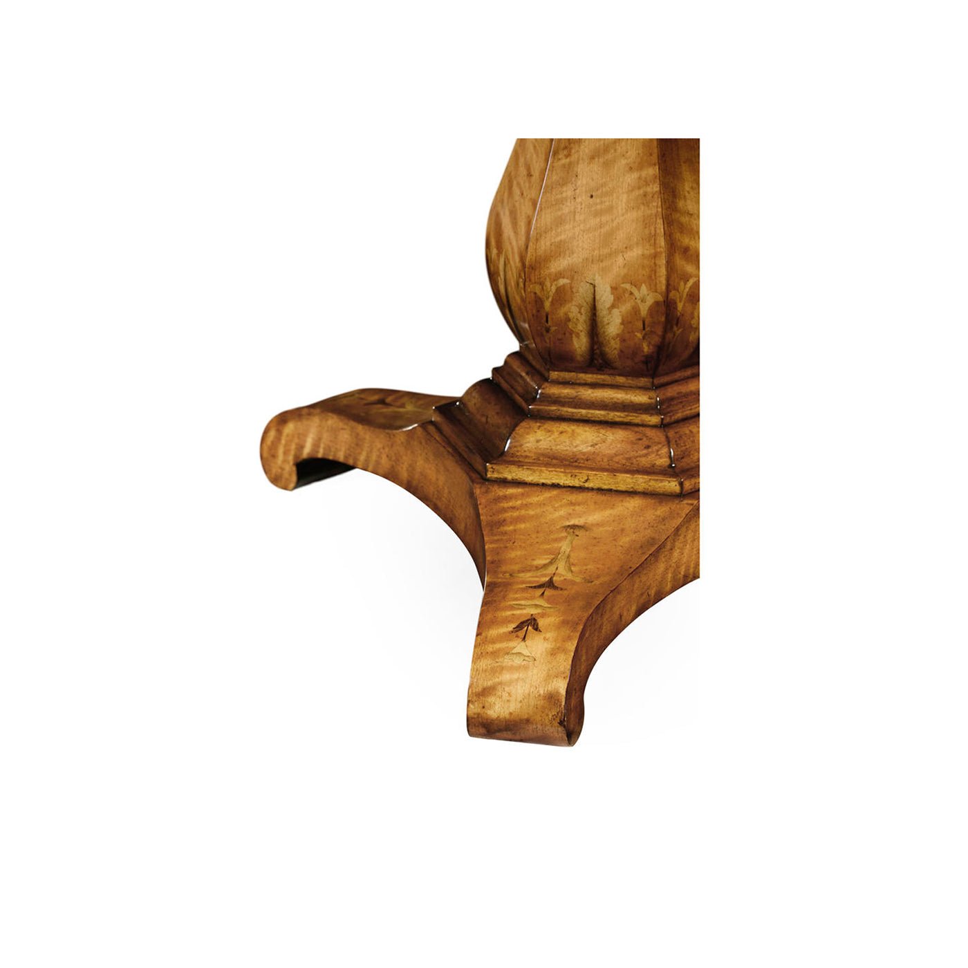 Detailed view of table base, curved wooden legs.
