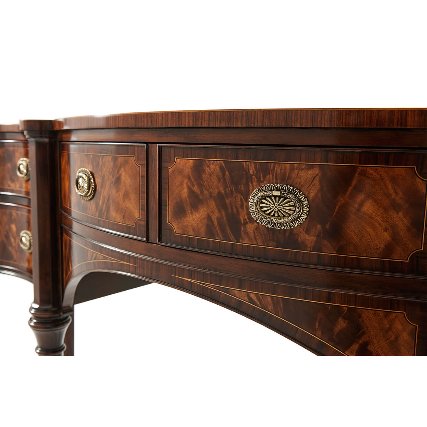 Close-up of sideboard drawers, decorative woodwork.