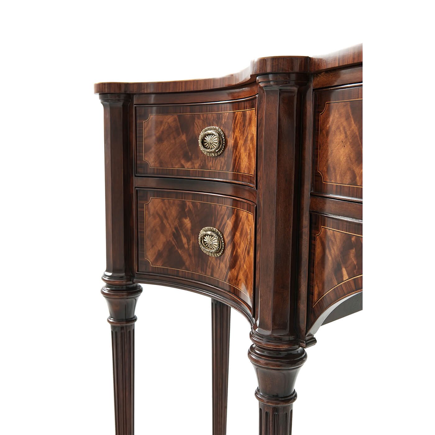 Mahogany sideboard drawer detail, ornate handles.