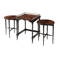 Three regency nesting side tables with ornate railing.