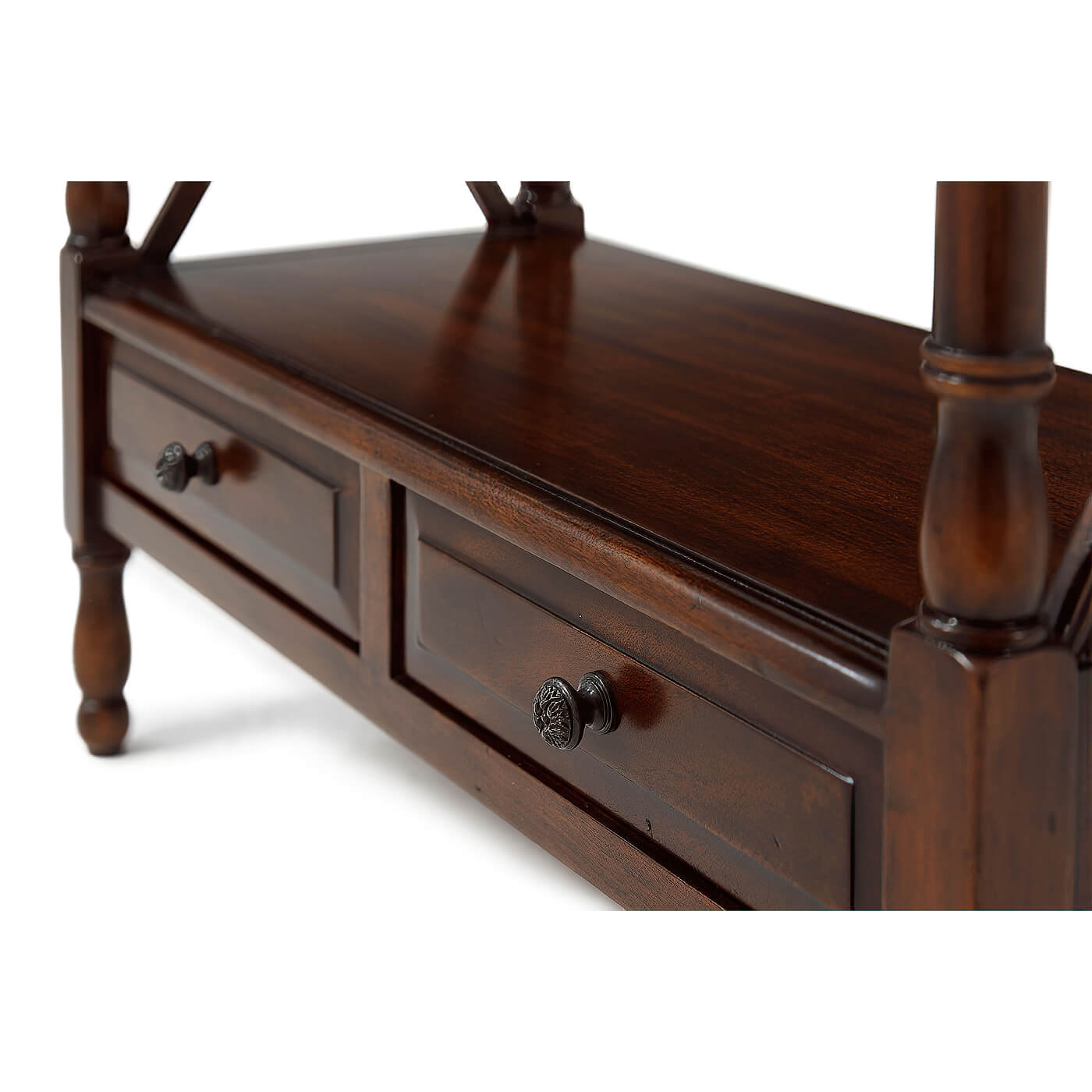 Close-up of etagere bookcase drawers and knobs.