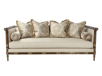 Elegant Regency sofa with decorative cushions, front view.