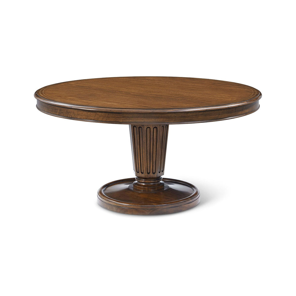Round wooden dining table, top view angle.