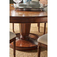 Close-up of dining table centerpiece and pedestal.